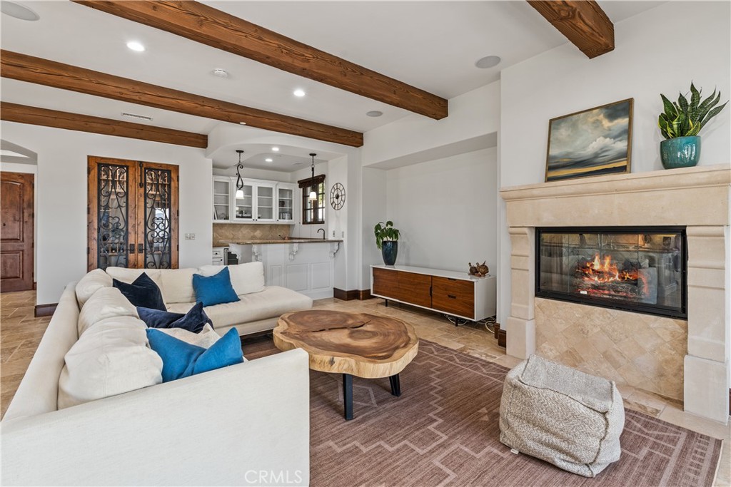 22 Sky Ranch Road Ladera Ranch, CA 92694 - Photo 20 of 54 a living room with furniture and a fireplace