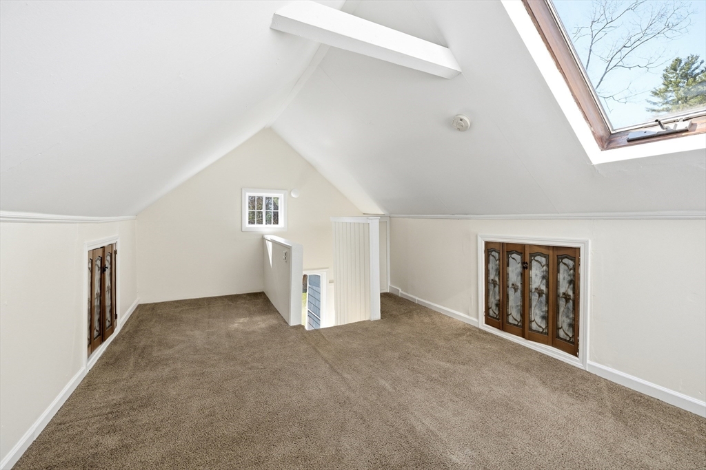 133 Lakeview Road Shutesbury, MA 01072 - Photo 12 of 24 a view of an empty room with a window