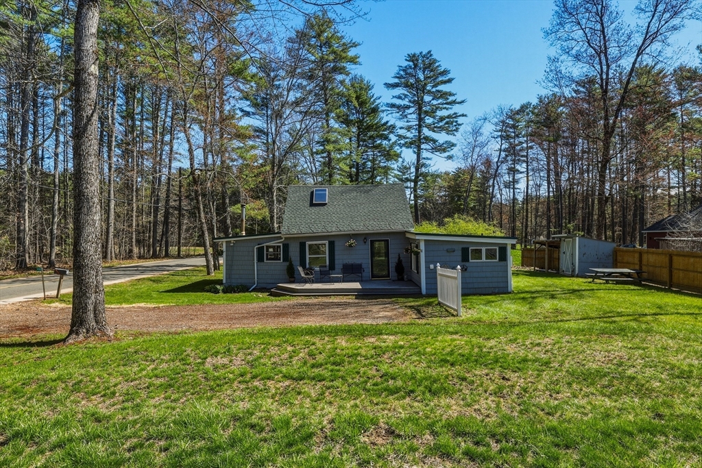 133 Lakeview Road Shutesbury, MA 01072 - Photo 18 of 24 a view of a house with backyard and sitting area