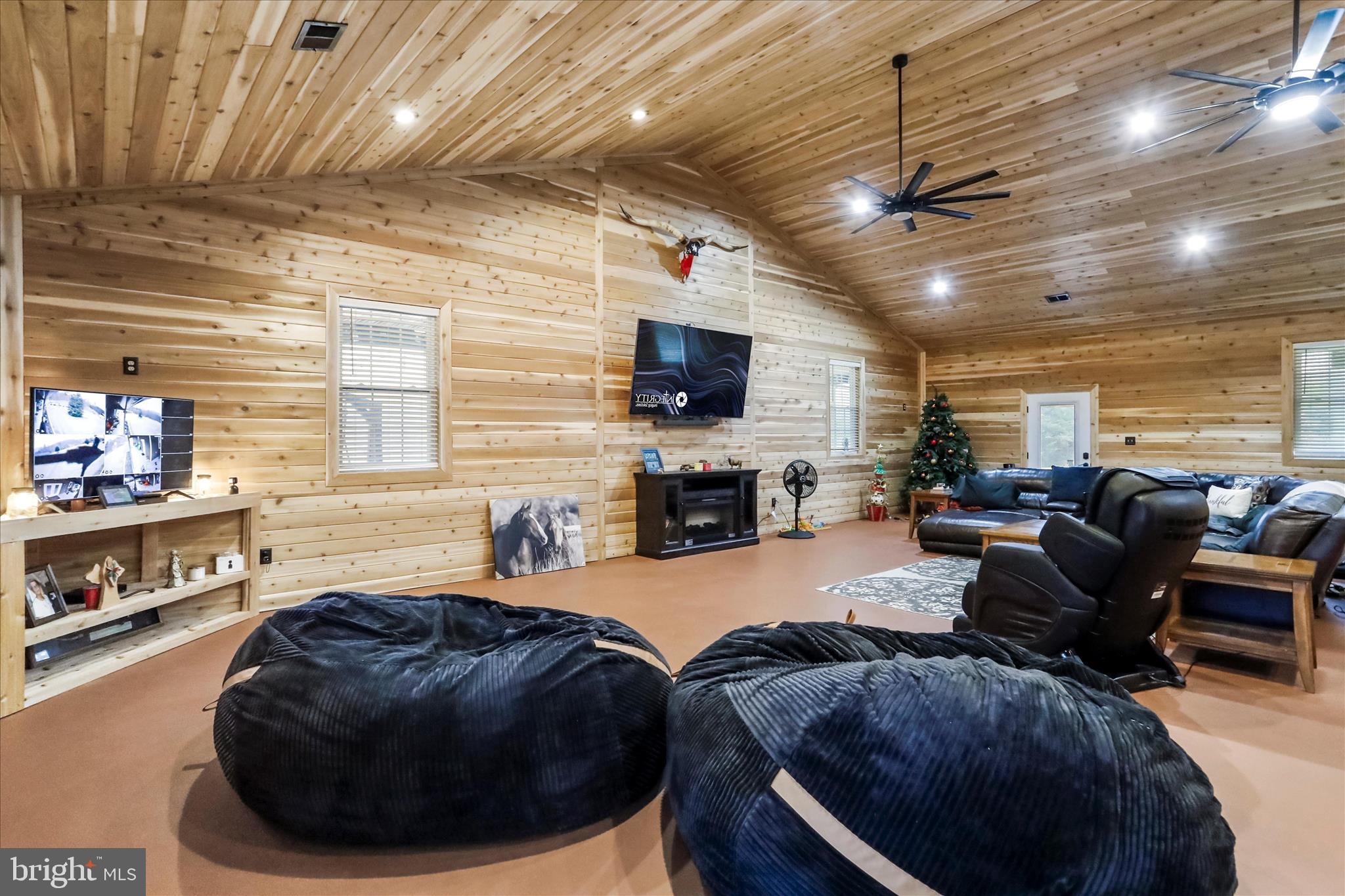 12542 Turkey Farm Road Northeast Little Orleans, MD 21766 - Photo 15 of 77 a living room with furniture and a fireplace