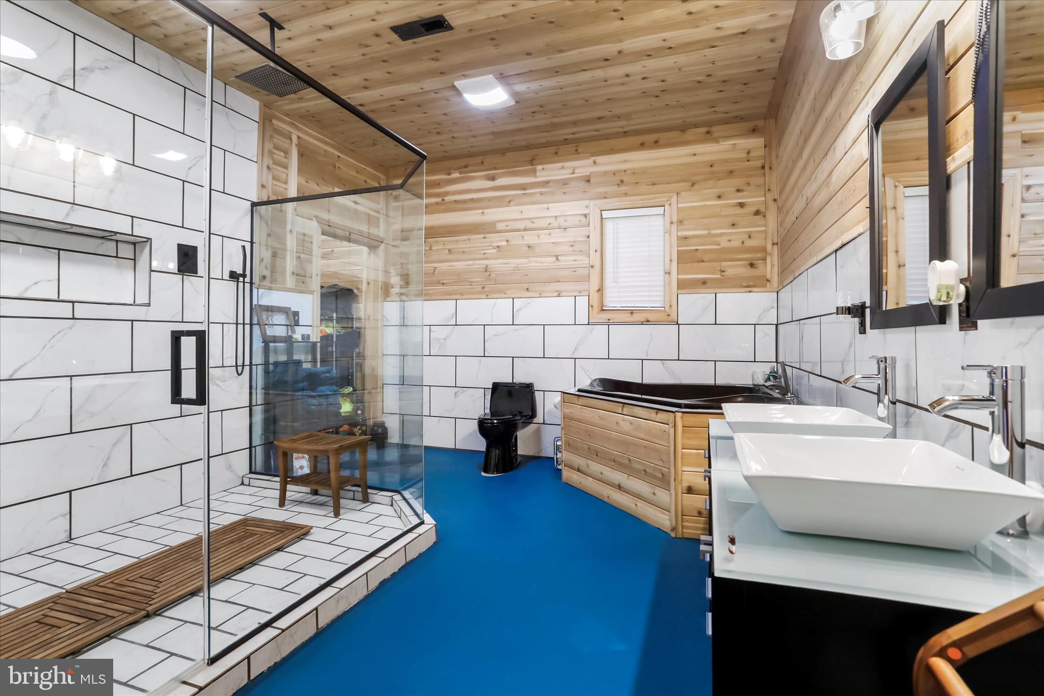 12542 Turkey Farm Road Northeast Little Orleans, MD 21766 - Photo 20 of 77 a kitchen with sink refrigerator and stove