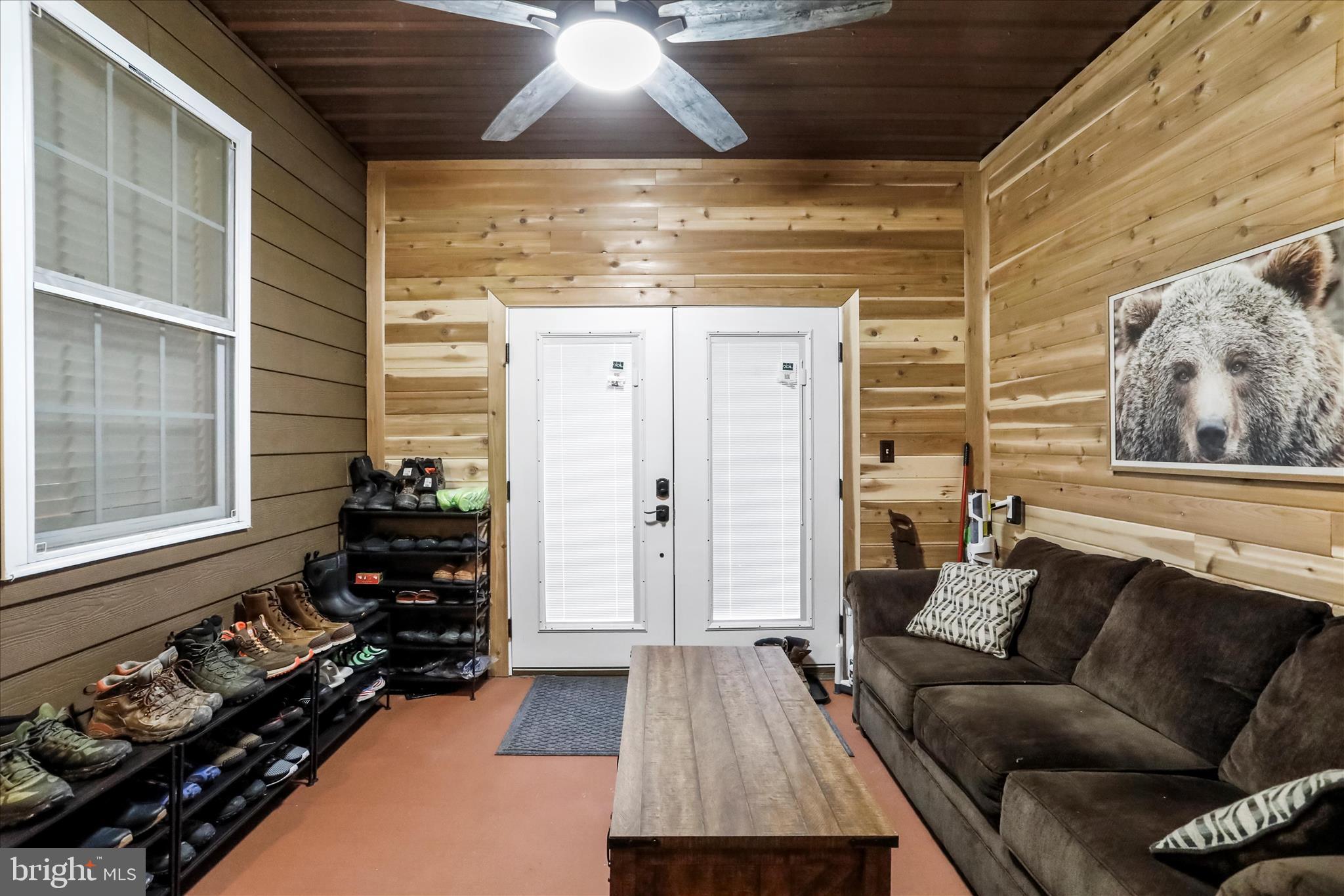 12542 Turkey Farm Road Northeast Little Orleans, MD 21766 - Photo 23 of 77 a livingroom with furniture and a flat screen tv