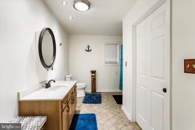 a bathroom with a bathtub and sink