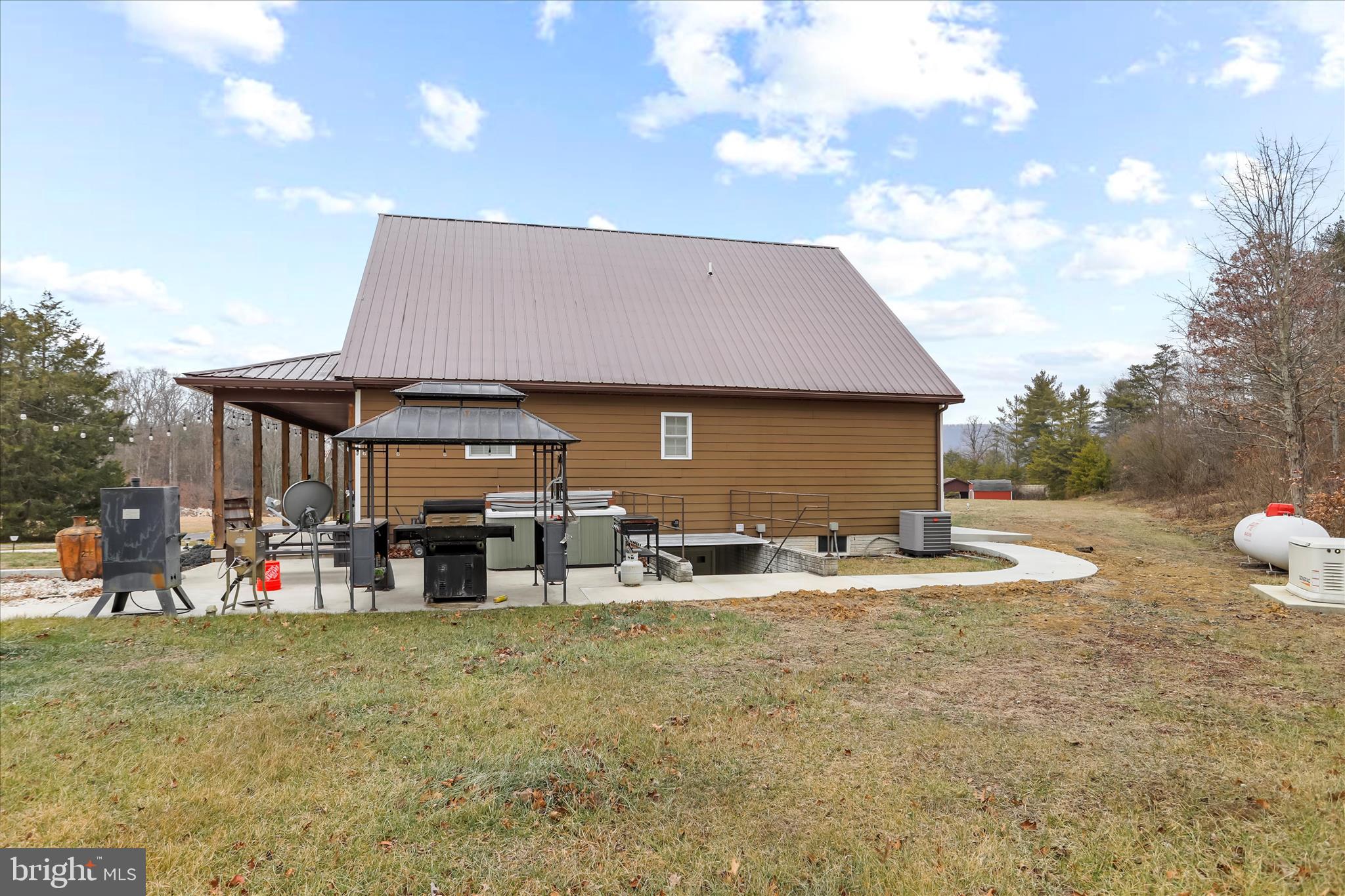 12542 Turkey Farm Road Northeast Little Orleans, MD 21766 - Photo 41 of 77 a couple of table and chairs in front of house