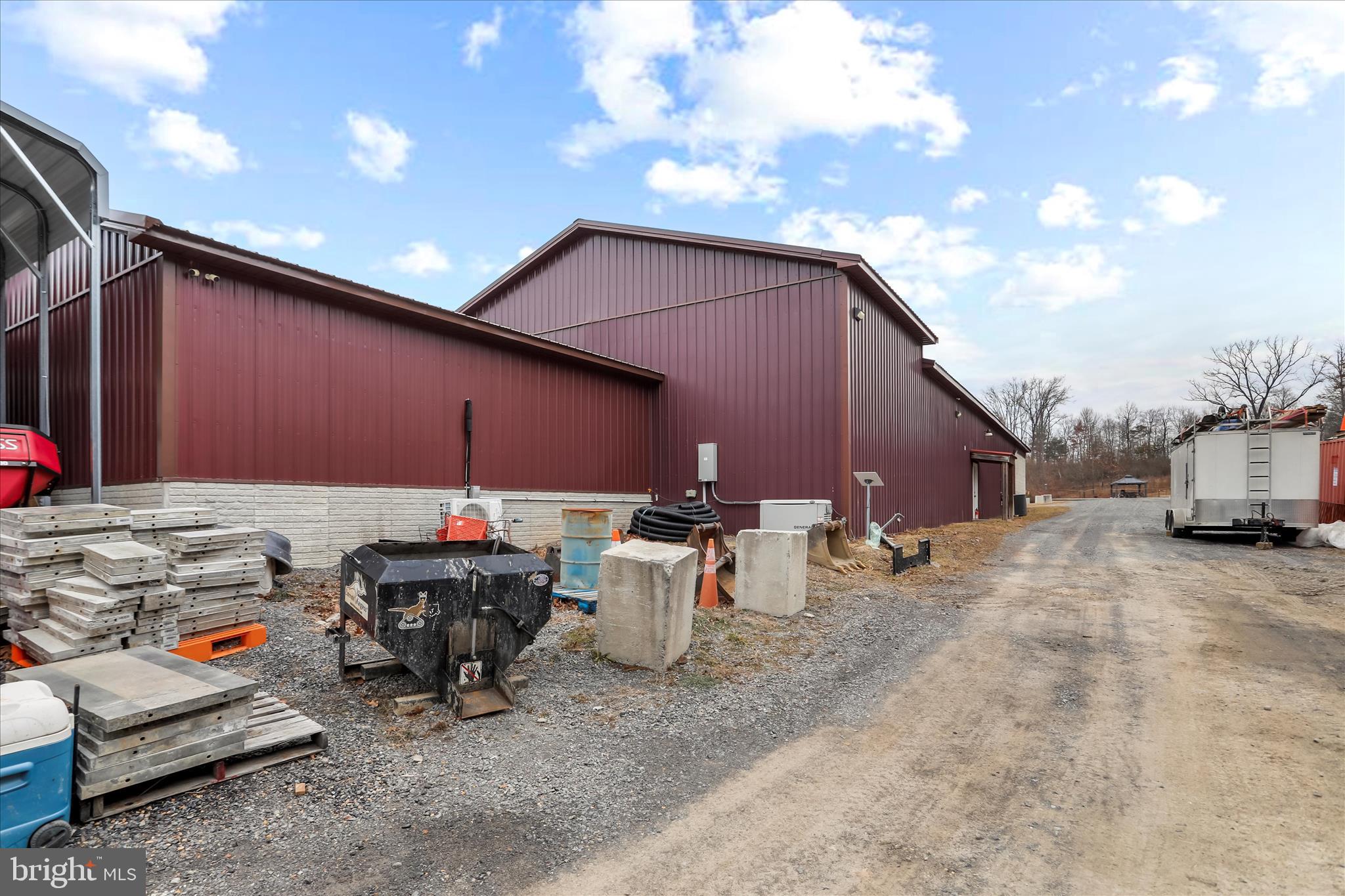 12542 Turkey Farm Road Northeast Little Orleans, MD 21766 - Photo 47 of 77 a view of backyard with table and chairs and potted plants