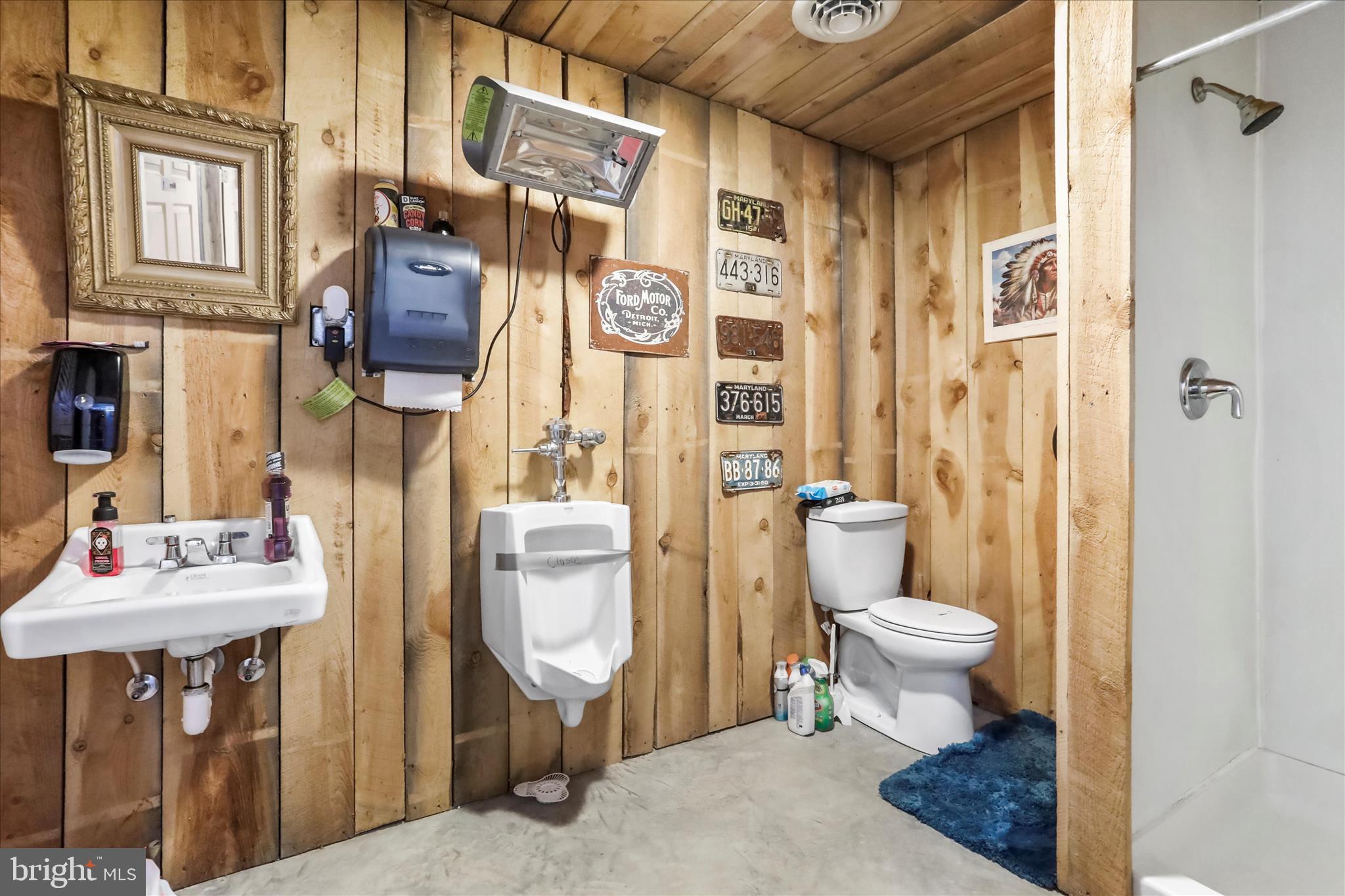 12542 Turkey Farm Road Northeast Little Orleans, MD 21766 - Photo 56 of 77 a bathroom with a toilet sink and shower