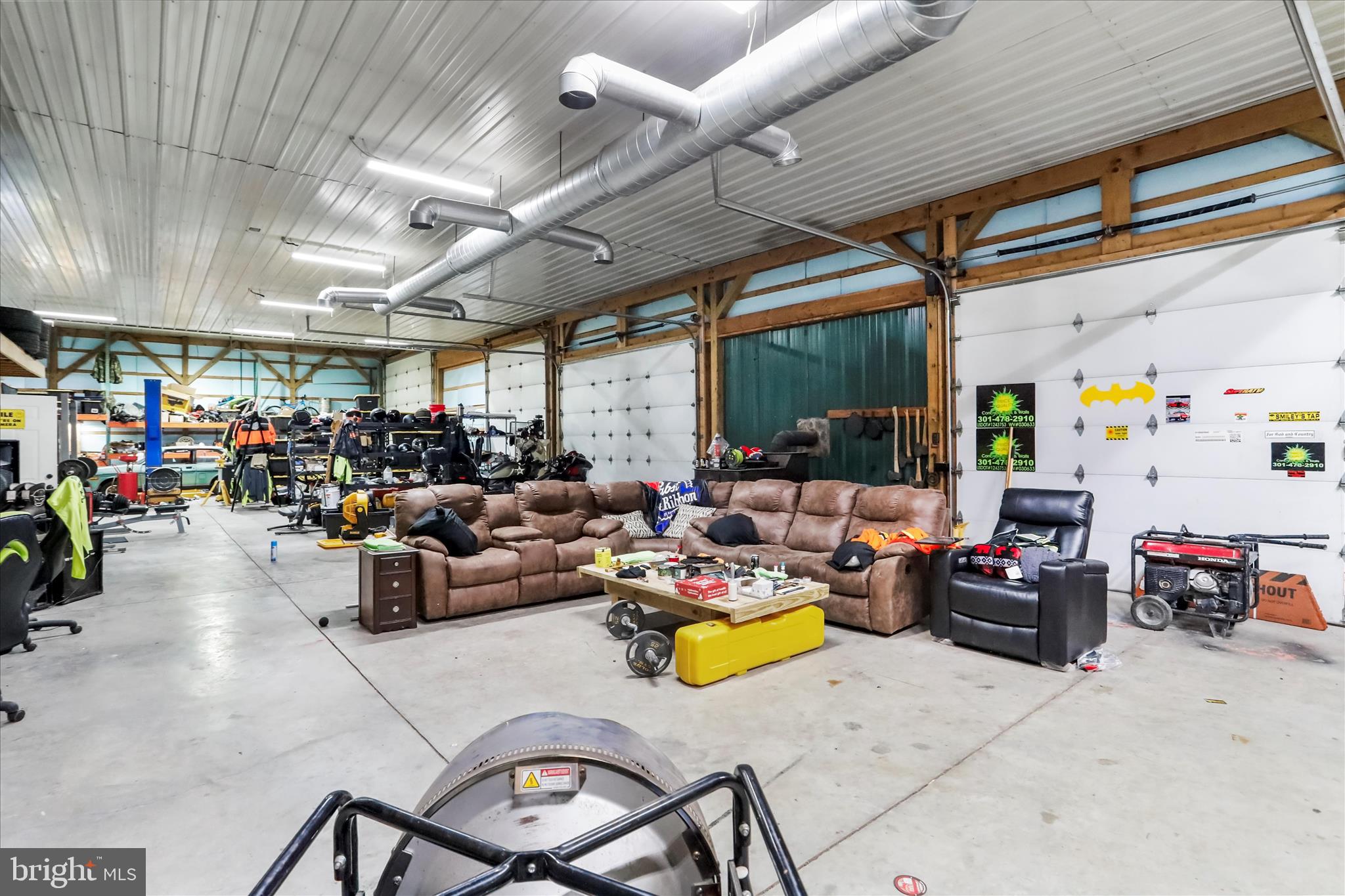 12542 Turkey Farm Road Northeast Little Orleans, MD 21766 - Photo 57 of 77 a group of people sitting in a garage
