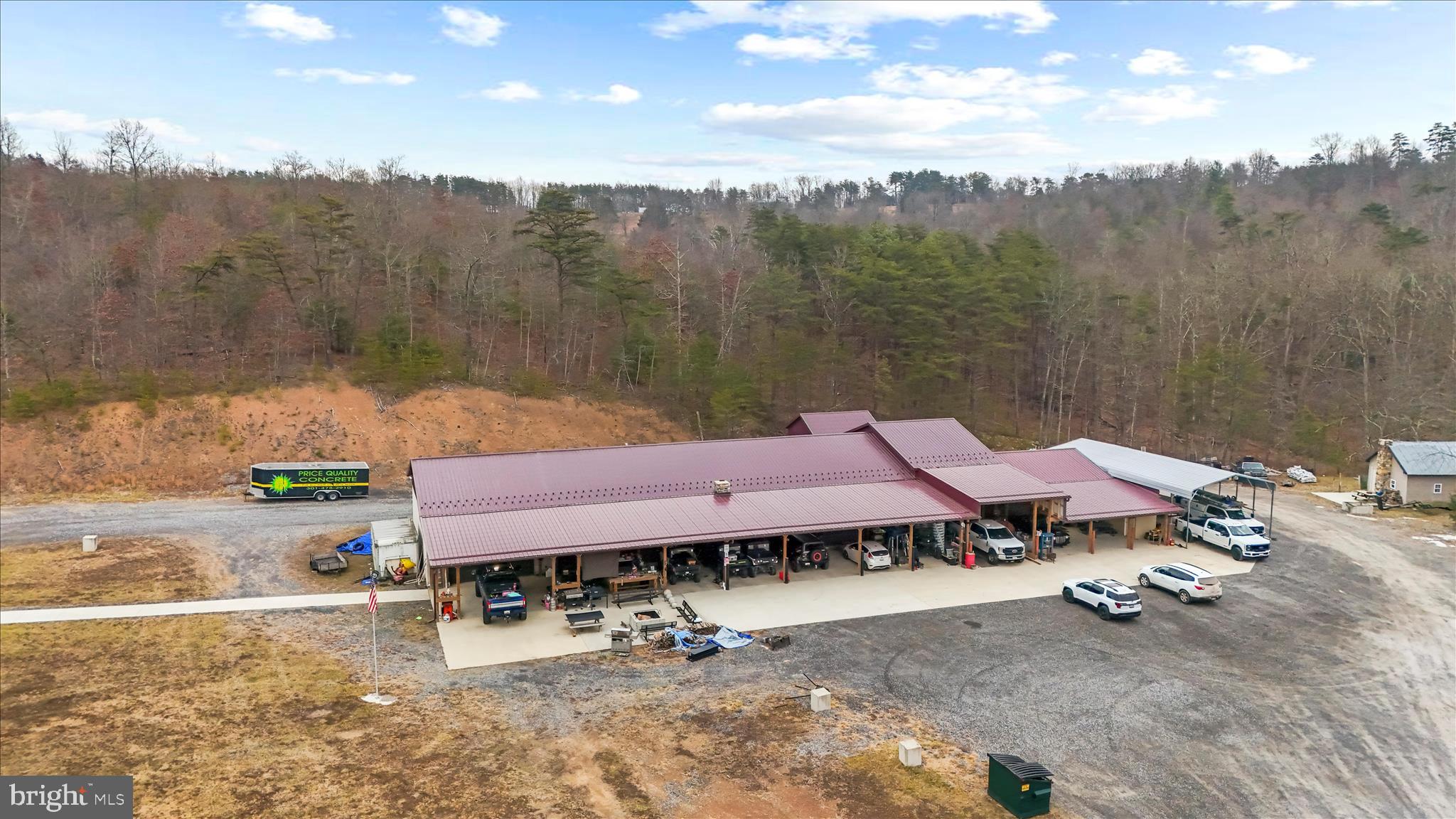 12542 Turkey Farm Road Northeast Little Orleans, MD 21766 - Photo 64 of 77 a view of a terrace with a table and chairs