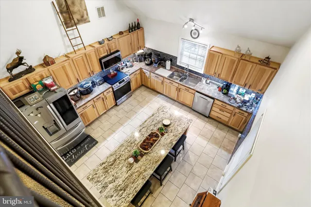 a dining room with furniture and a fireplace