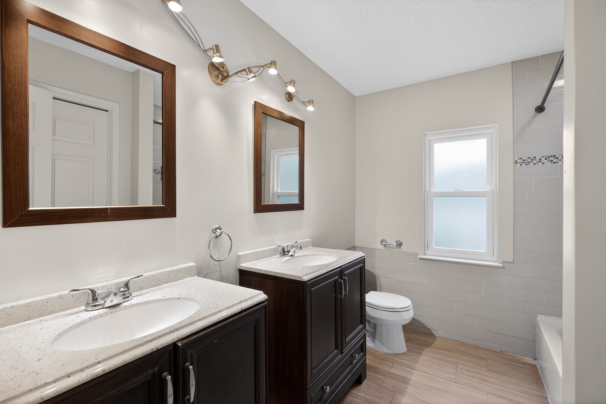 918 Long Prairie Drive Katy, TX 77450 - Photo 27 of 30 a bathroom with double sink and a toilet