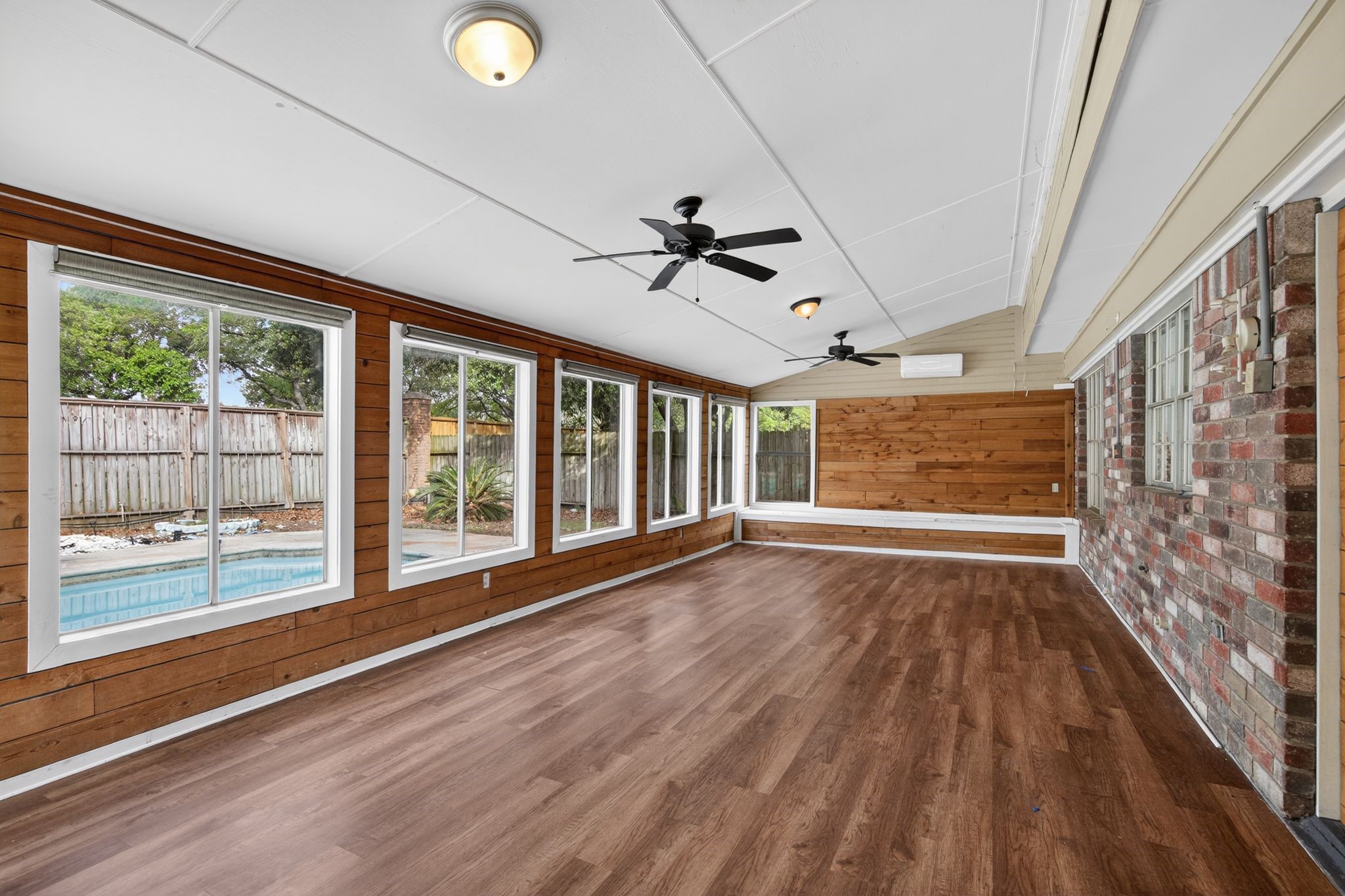 918 Long Prairie Drive Katy, TX 77450 - Photo 30 of 30 a view of an empty room with wooden floor and a window