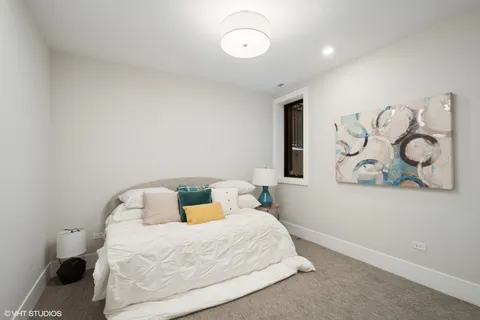 a work room with furniture and a lamp