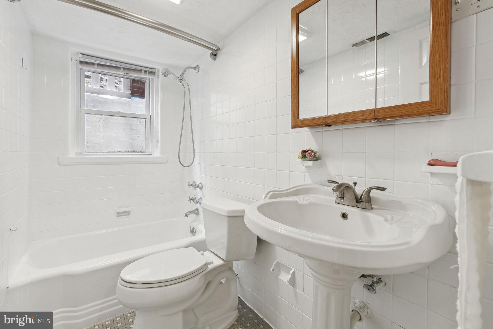 4024 Garrison Boulevard Baltimore, MD 21215 - Photo 38 of 40 4th Bathroom