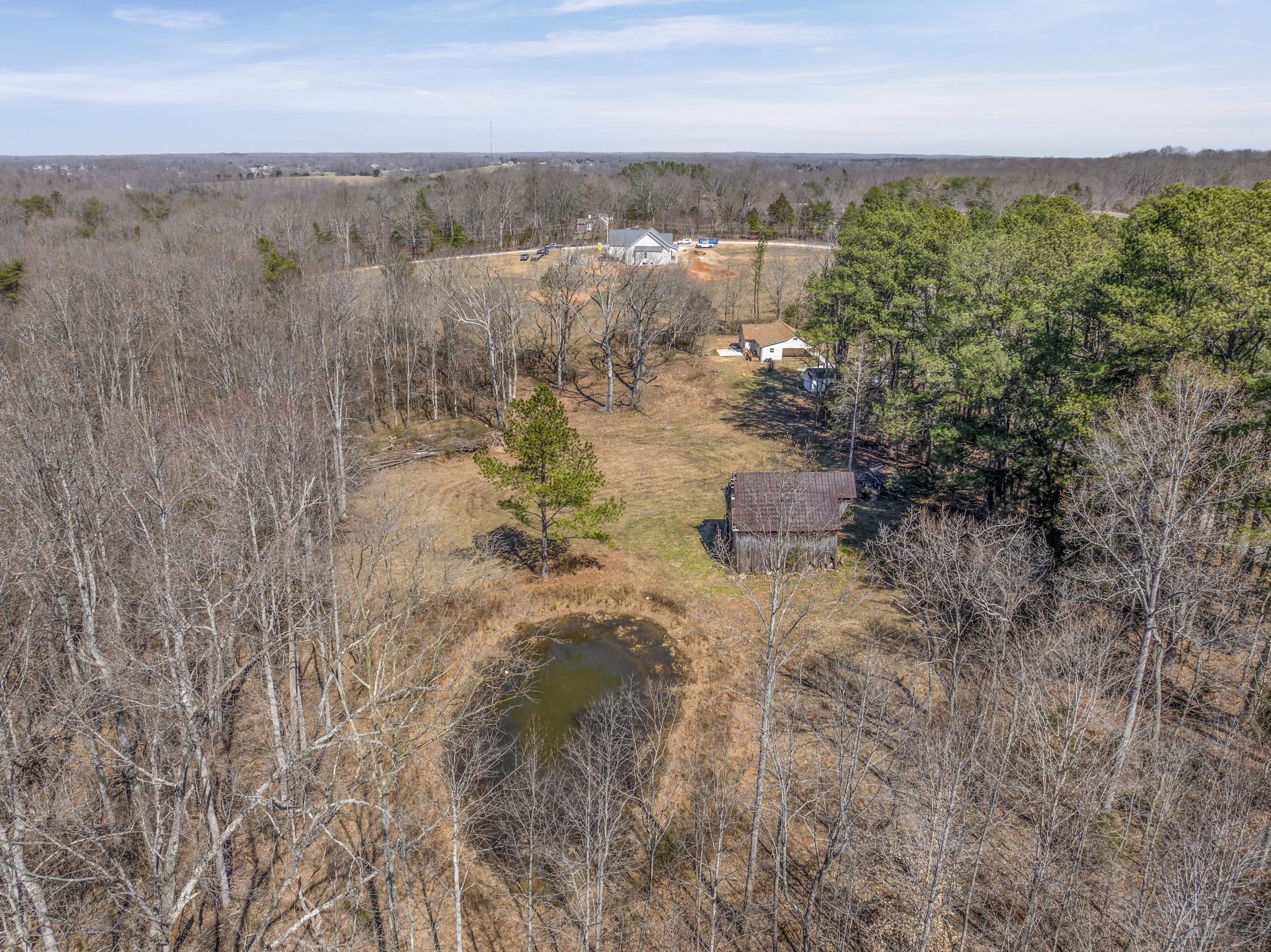 0 Spencer Mill Road Burns, TN 37029 - Photo 22 of 26 a view of a lake with mountains in the background
