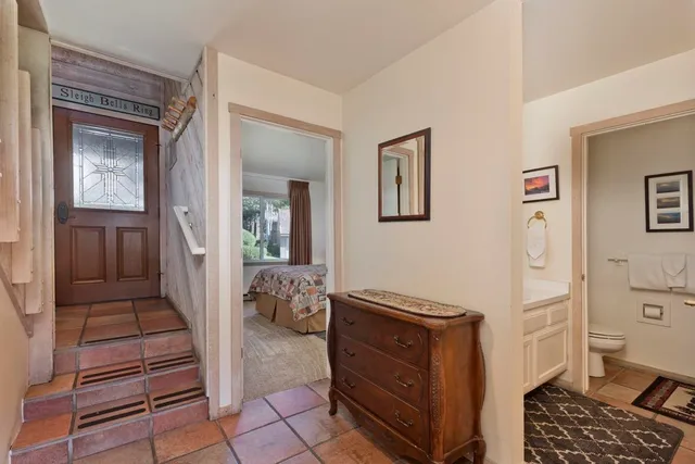 a room with furniture and wooden floor