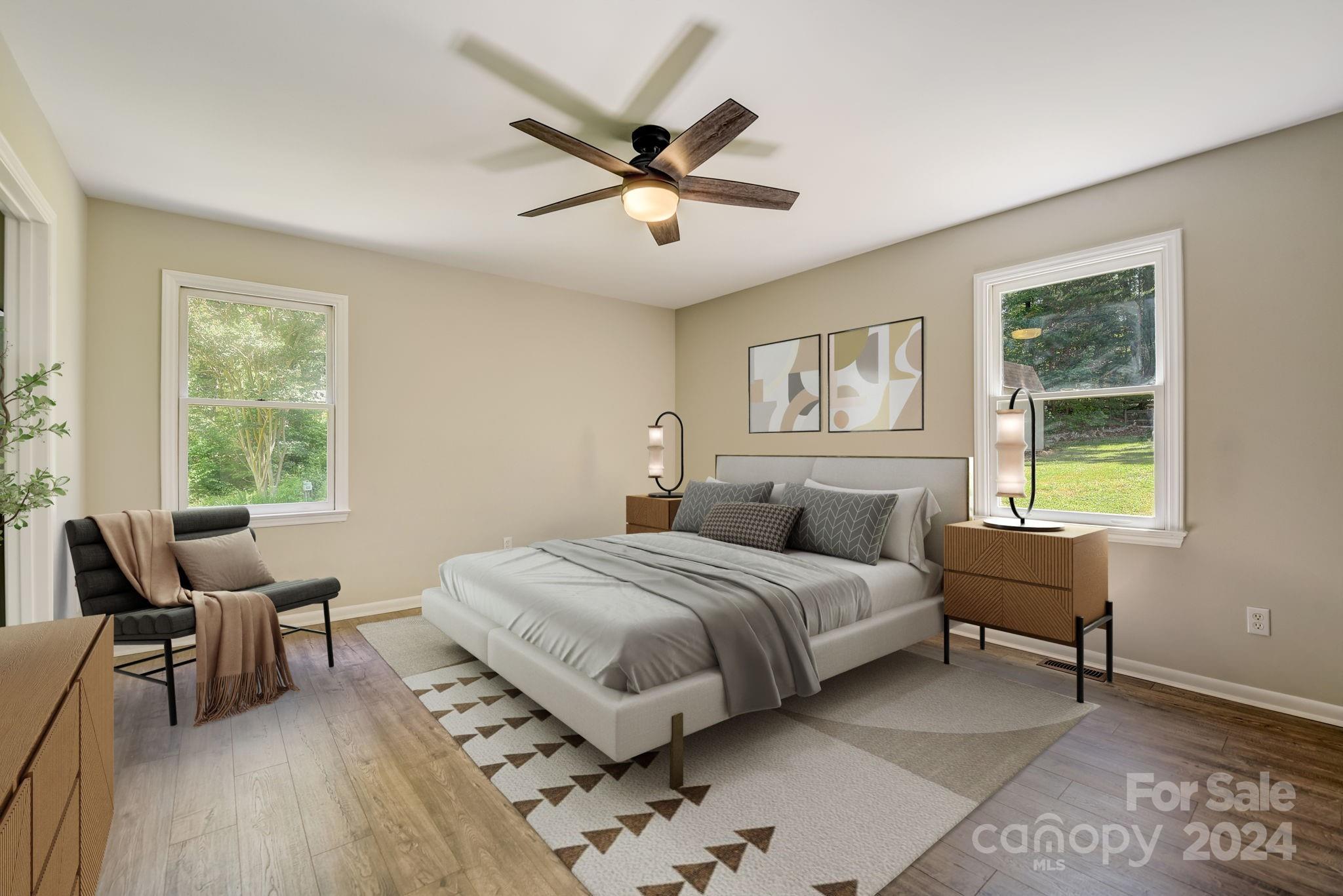 16218 Barbee Road Stanfield, NC 28163 - Photo 19 of 48 a bedroom with a bed and a large window