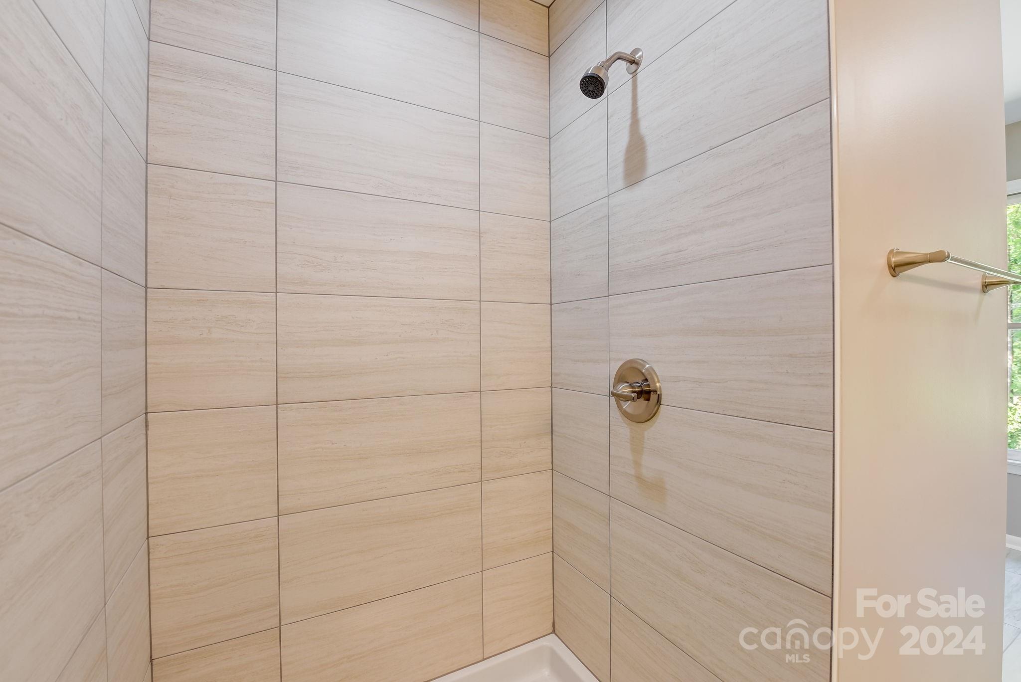 16218 Barbee Road Stanfield, NC 28163 - Photo 24 of 48 a bathroom with a shower