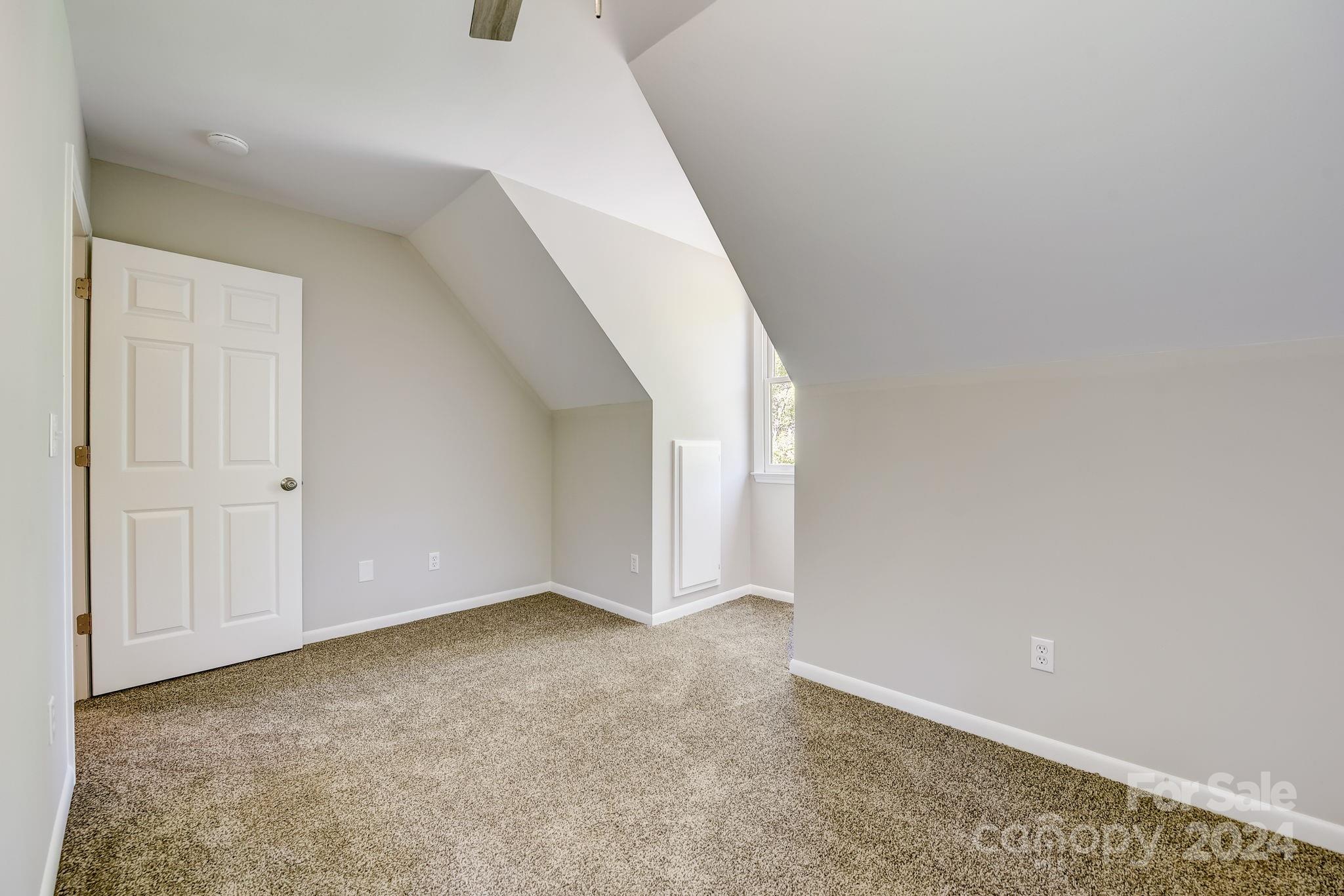 16218 Barbee Road Stanfield, NC 28163 - Photo 30 of 48 a view of an empty room with windows