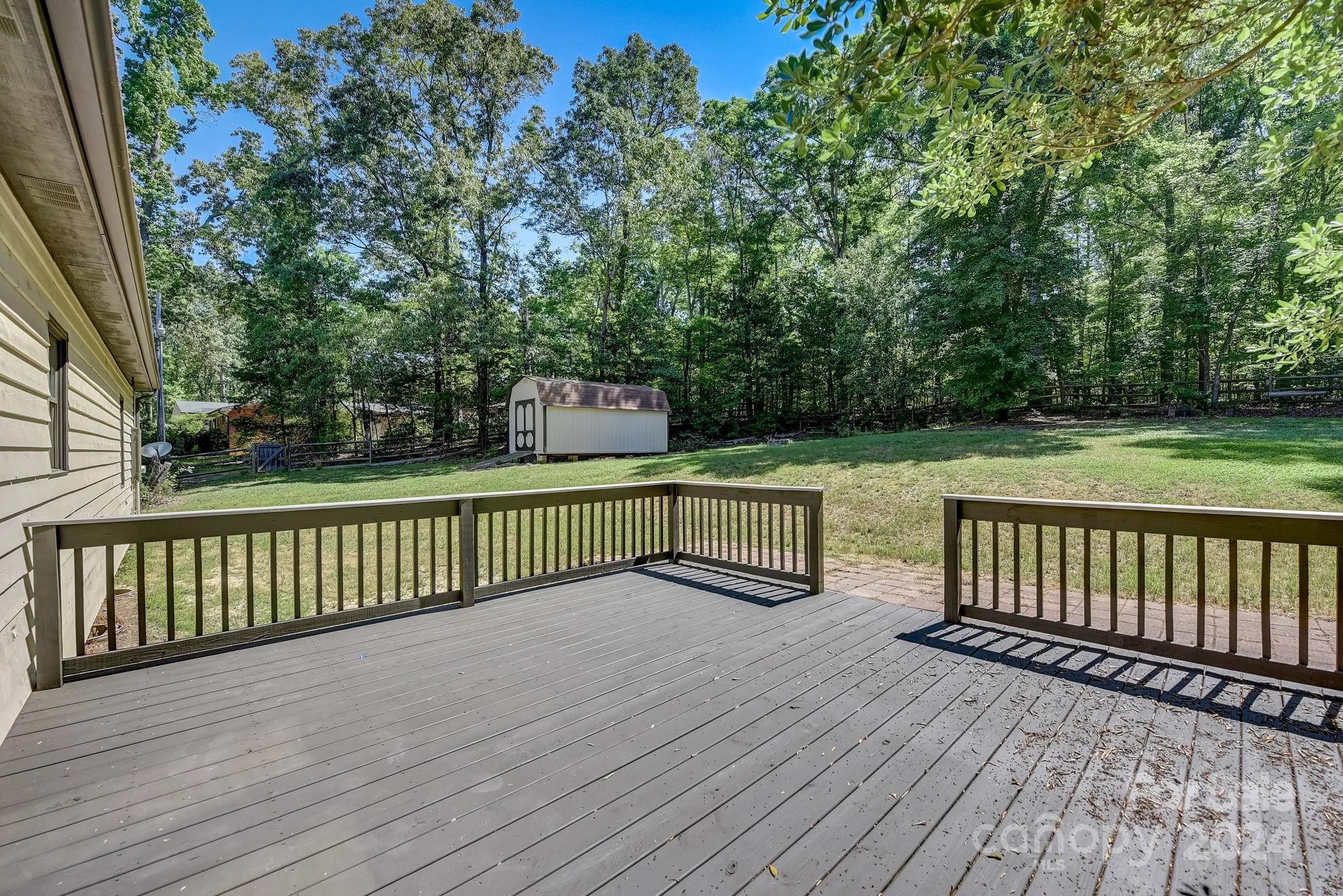 16218 Barbee Road Stanfield, NC 28163 - Photo 34 of 48 a view of balcony with wooden floor and fence