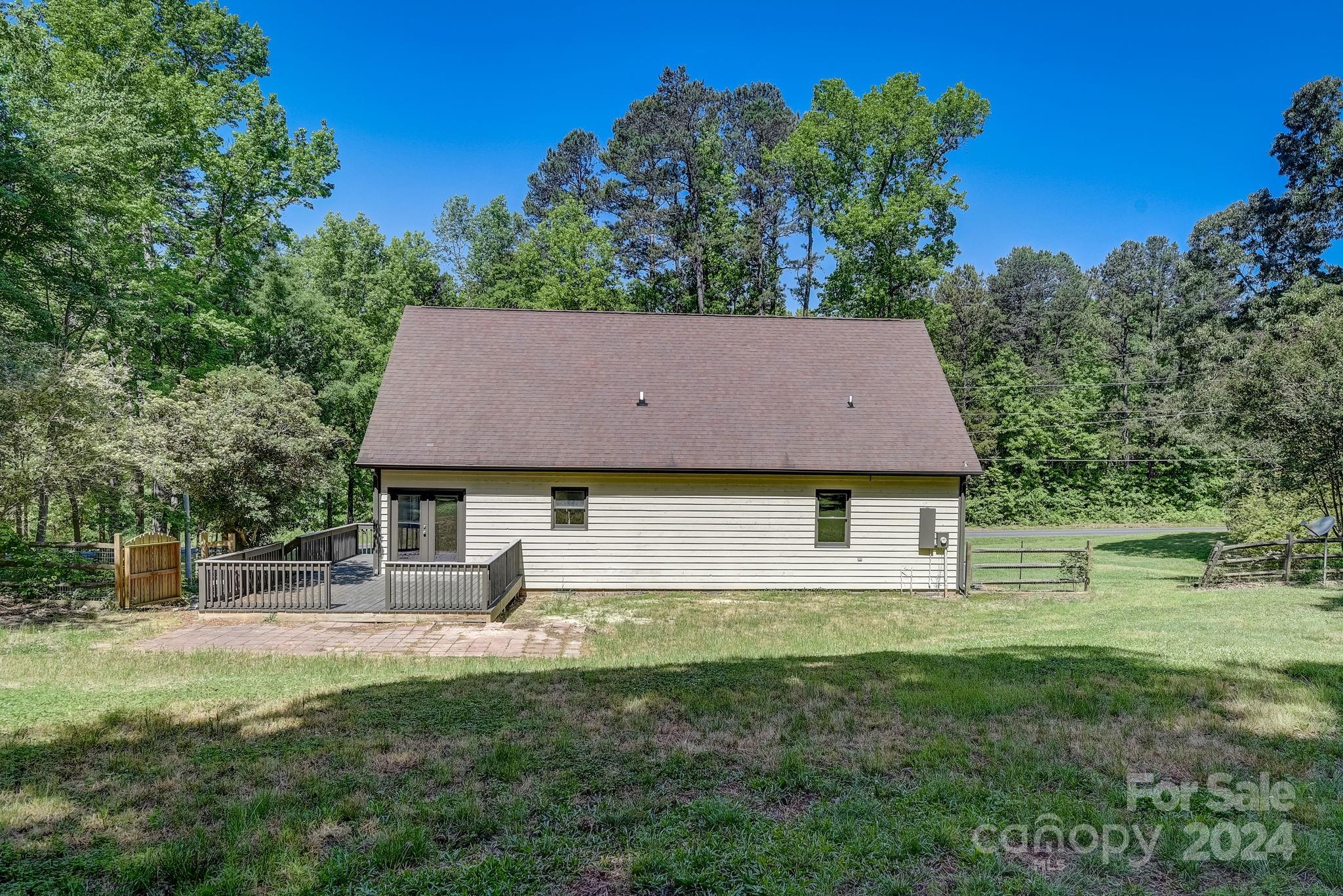 16218 Barbee Road Stanfield, NC 28163 - Photo 38 of 48 a house view with a garden space