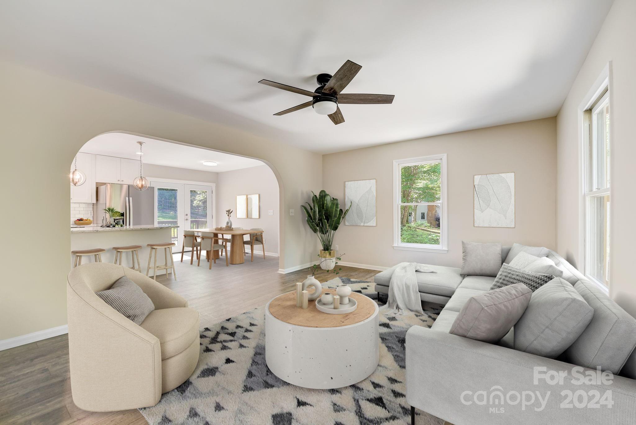16218 Barbee Road Stanfield, NC 28163 - Photo 6 of 48 a living room with furniture and a large window