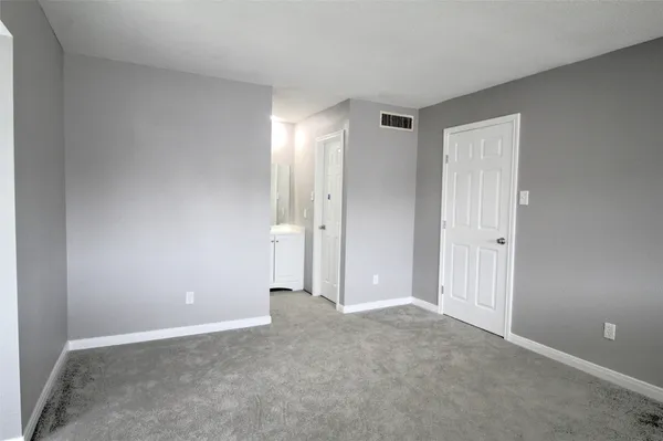 an empty room with an entryway