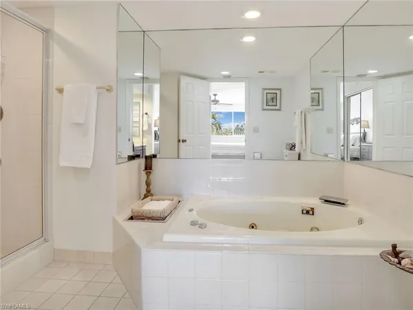 a bathroom with a bathtub and a sink