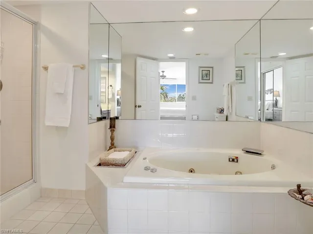 a bathroom with a bathtub and a sink