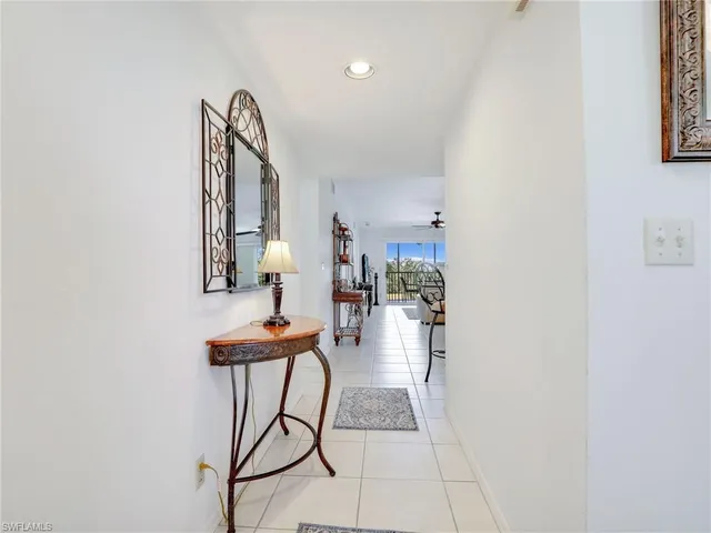 a view of a livingroom with furniture and a rug