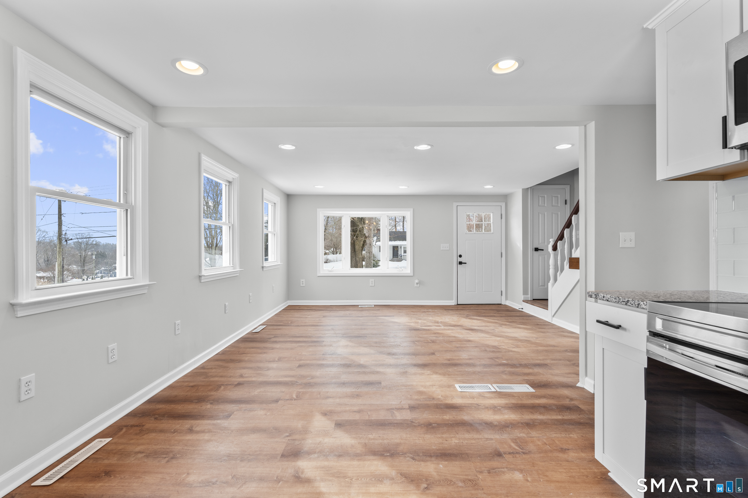 244 Curtiss Street Southington, CT 06489 - Photo 11 of 37 a view of an empty room with a window and fireplace