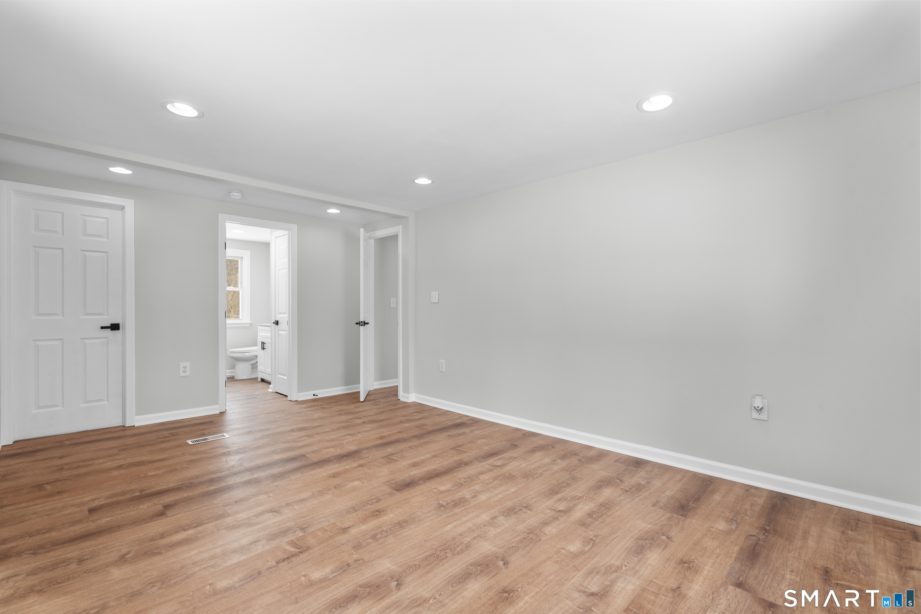244 Curtiss Street Southington, CT 06489 - Photo 21 of 37 a view of an empty room with wooden floor