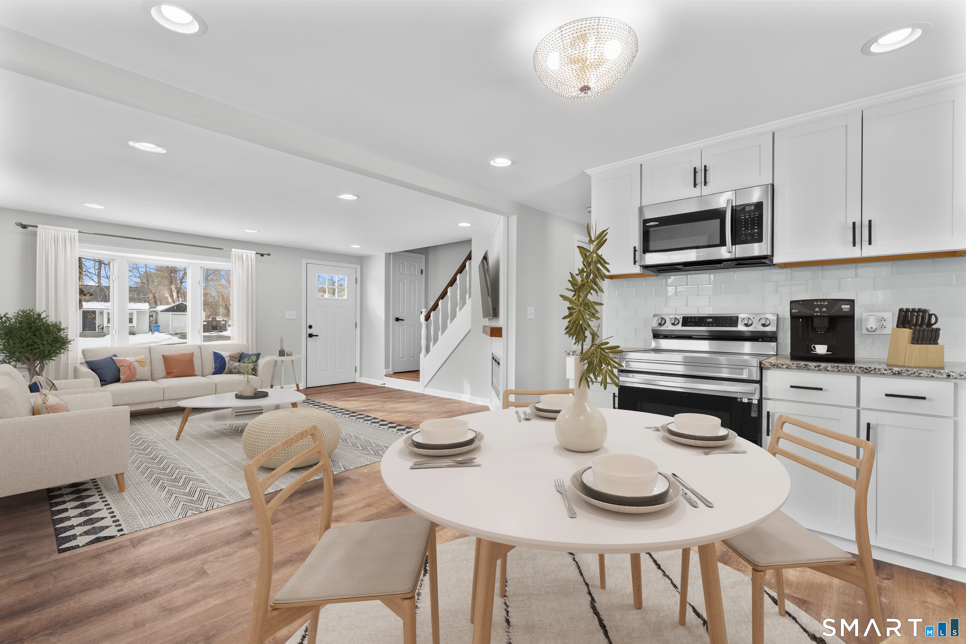 244 Curtiss Street Southington, CT 06489 - Photo 3 of 37 a kitchen with stainless steel appliances kitchen island granite countertop a sink and cabinets