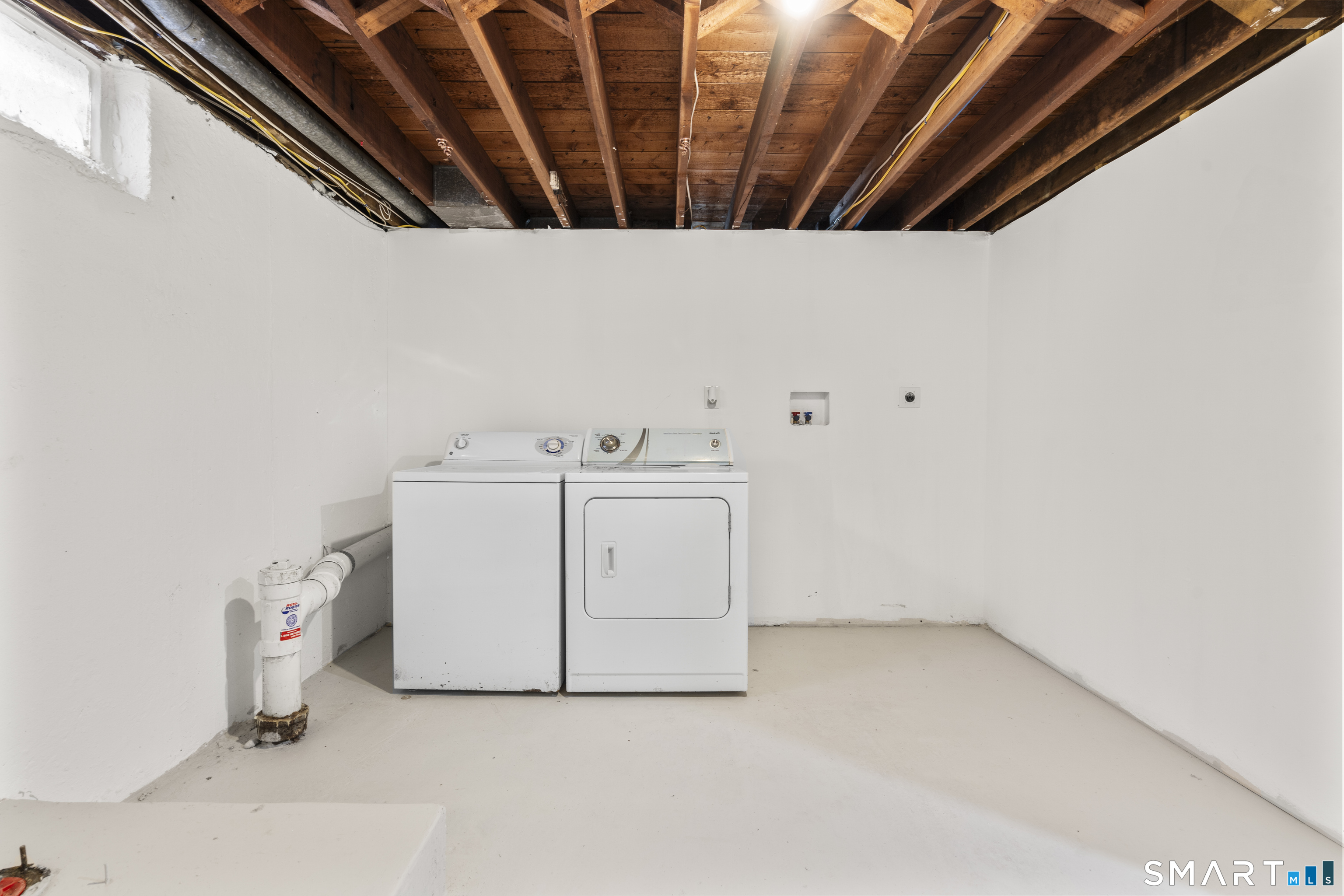 244 Curtiss Street Southington, CT 06489 - Photo 33 of 37 a utility room with dryer and washer