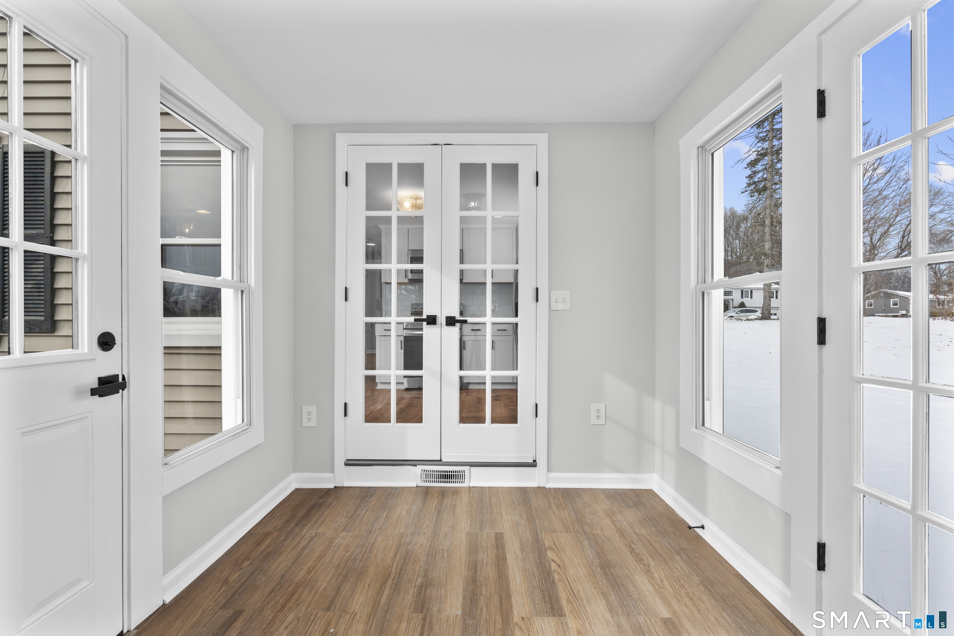 244 Curtiss Street Southington, CT 06489 - Photo 7 of 37 wooden floor in an empty room with a window