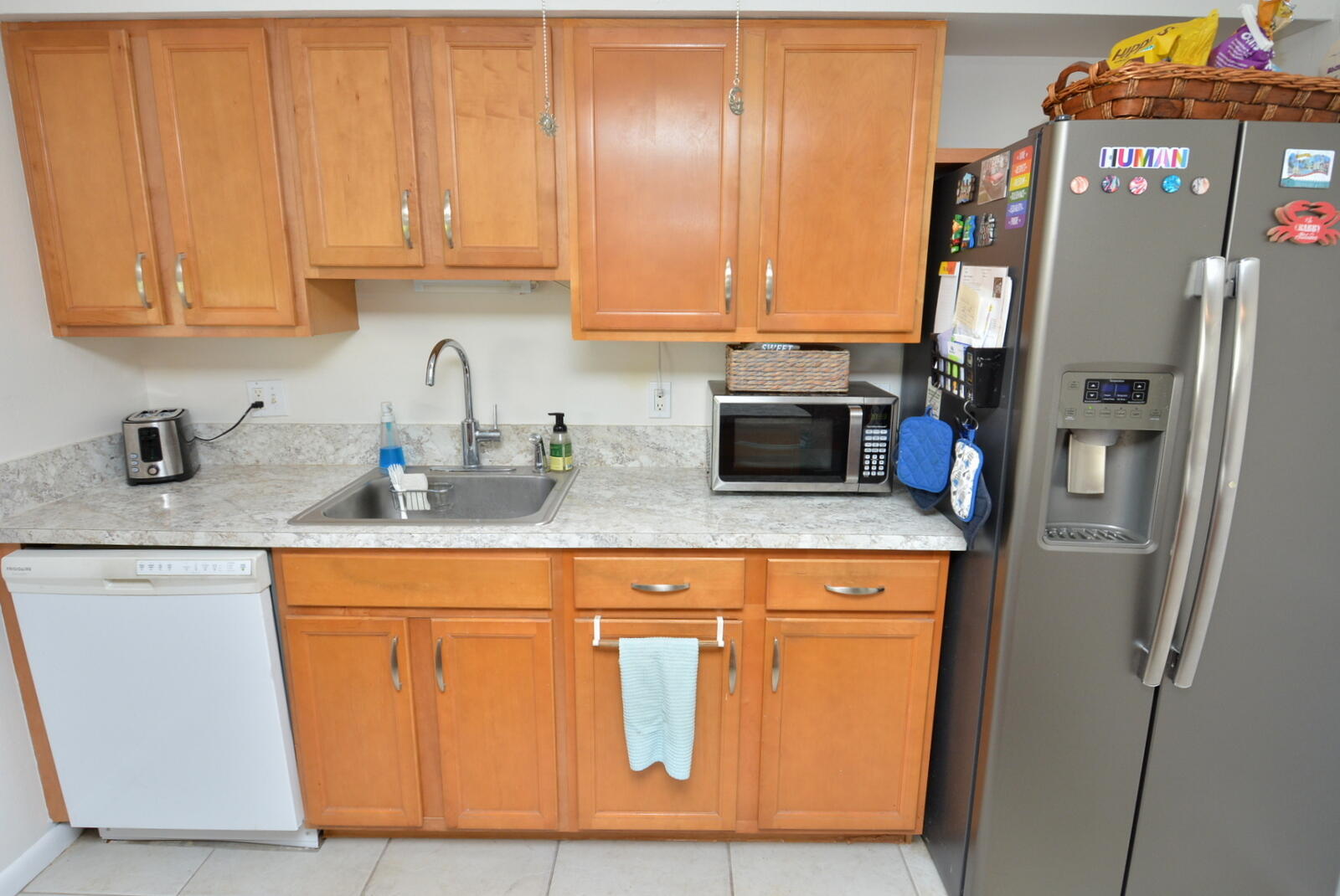 950 South Kanner Highway, Unit TH9 Stuart, FL 34994 - Photo 11 of 51 a kitchen with stainless steel appliances granite countertop a refrigerator and a sink
