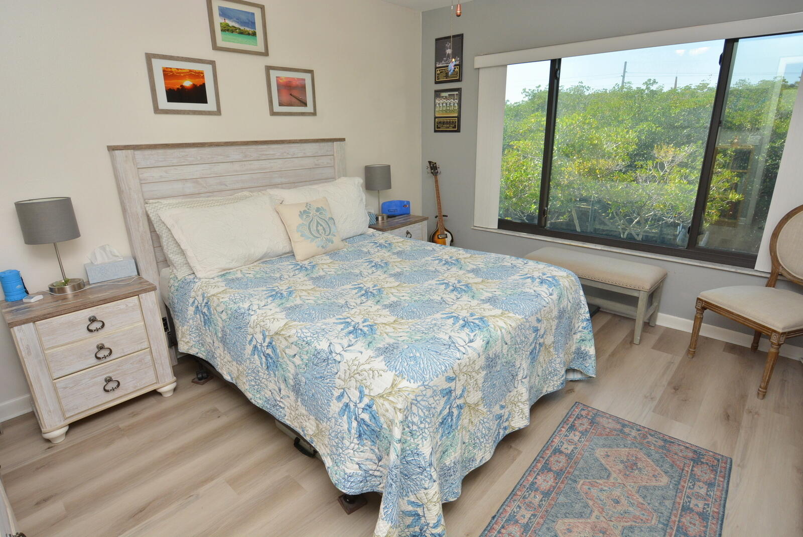 950 South Kanner Highway, Unit TH9 Stuart, FL 34994 - Photo 24 of 51 a bedroom with a bed and a large window