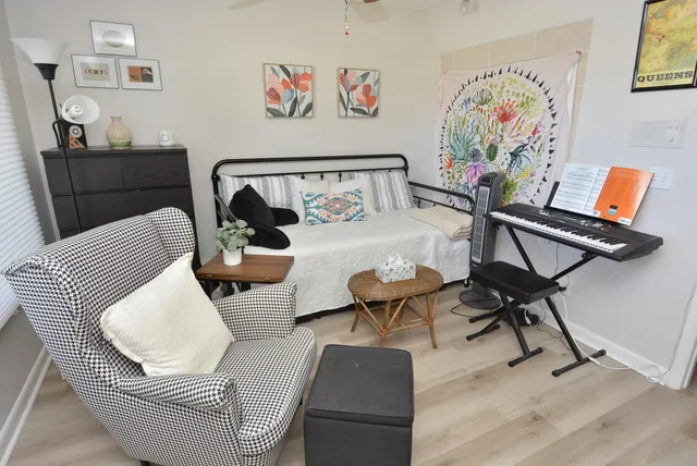 a living room with a couch and a table in it