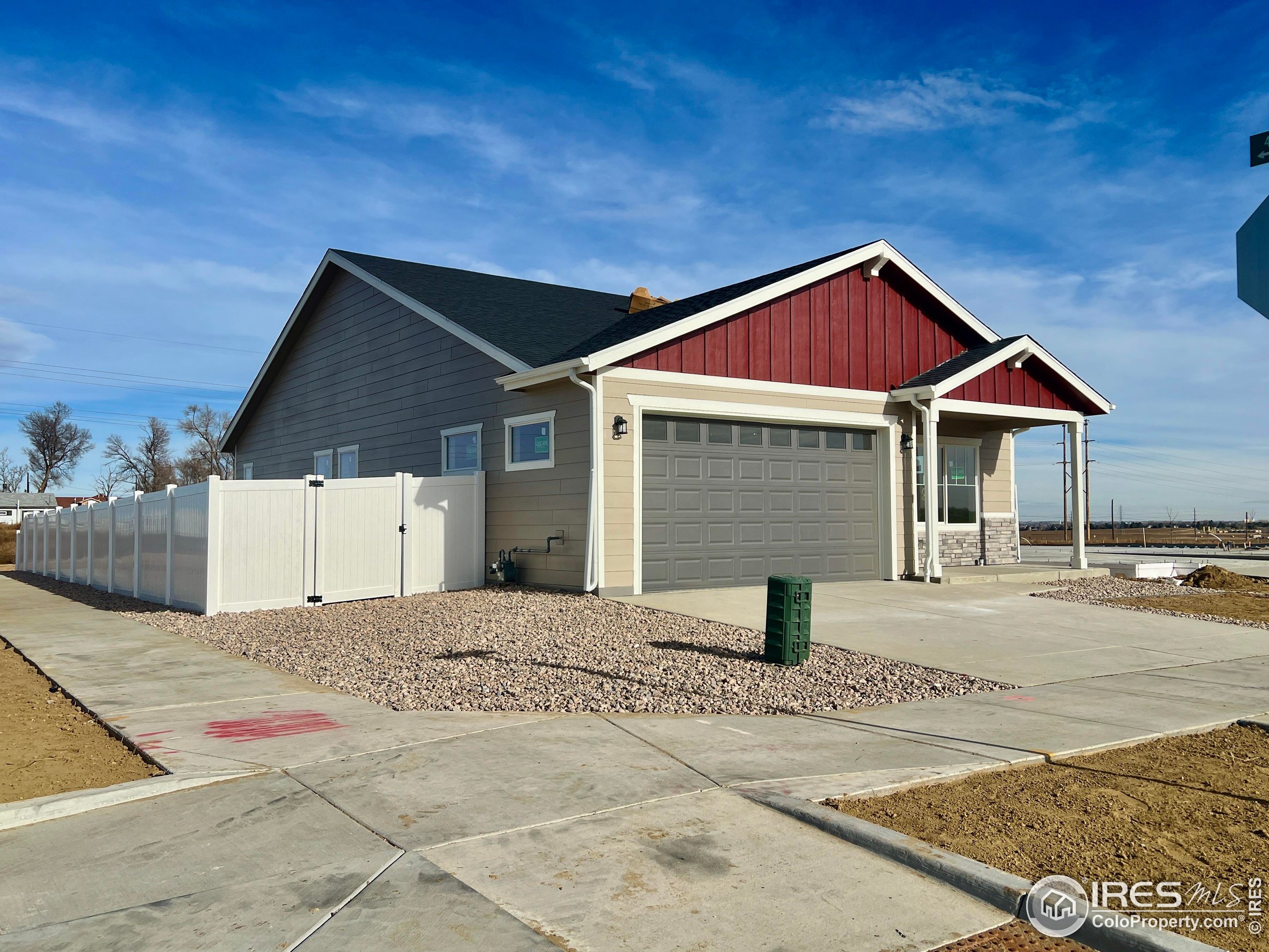 8535 West 5th Street Greeley, CO 80634 - Photo 3 of 12 a front view of a house with yard