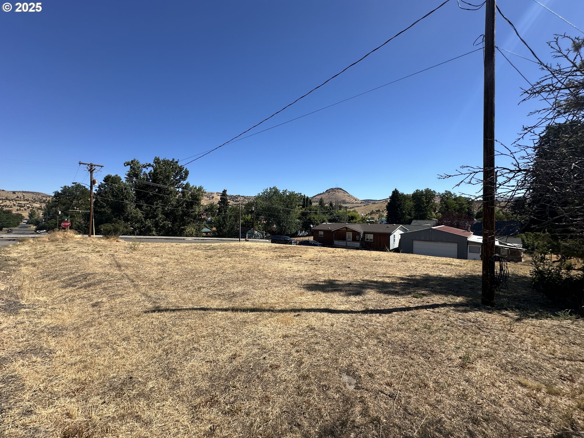 7th Street Fossil, OR 97830 - Photo 4 of 6 a view of dirt yard