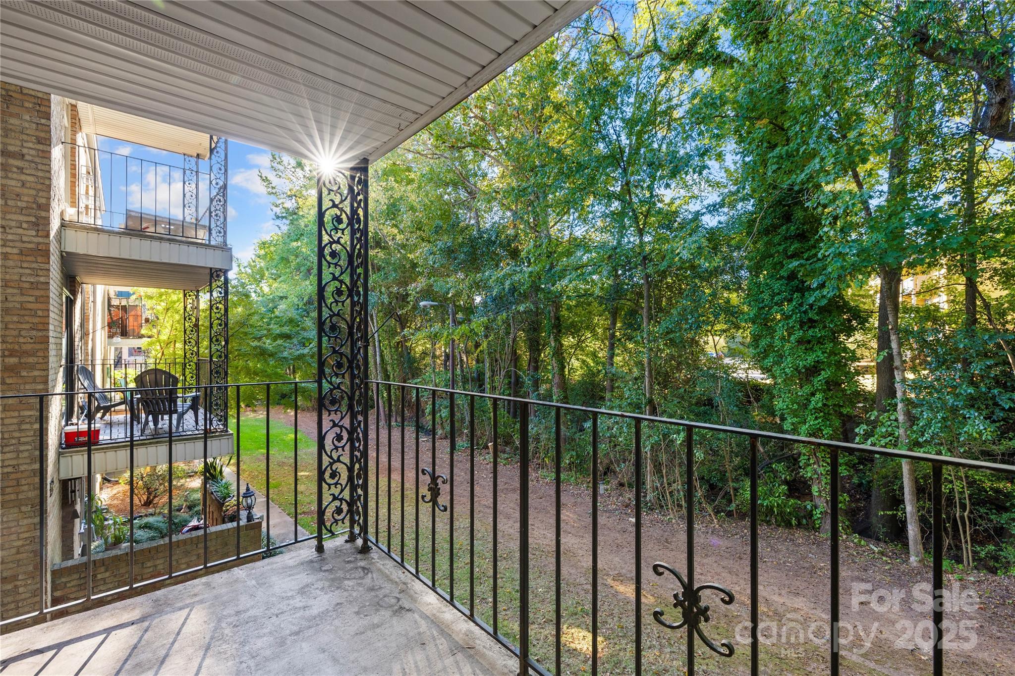 4754 Hedgemore Drive, Unit P Charlotte, NC 28209 - Photo 2 of 19 a view of a balcony