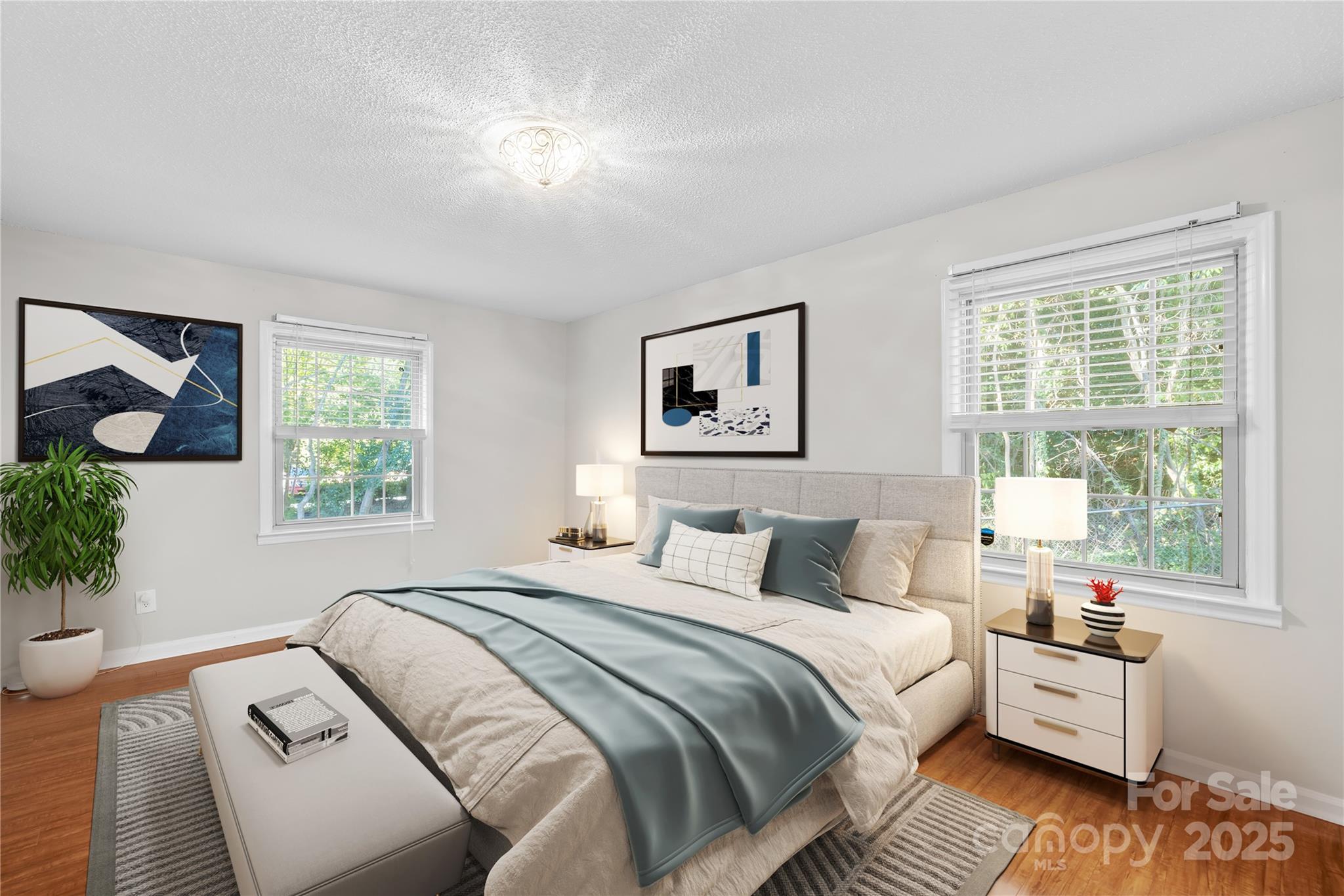 4754 Hedgemore Drive, Unit P Charlotte, NC 28209 - Photo 7 of 19 a bedroom with a large bed and a window