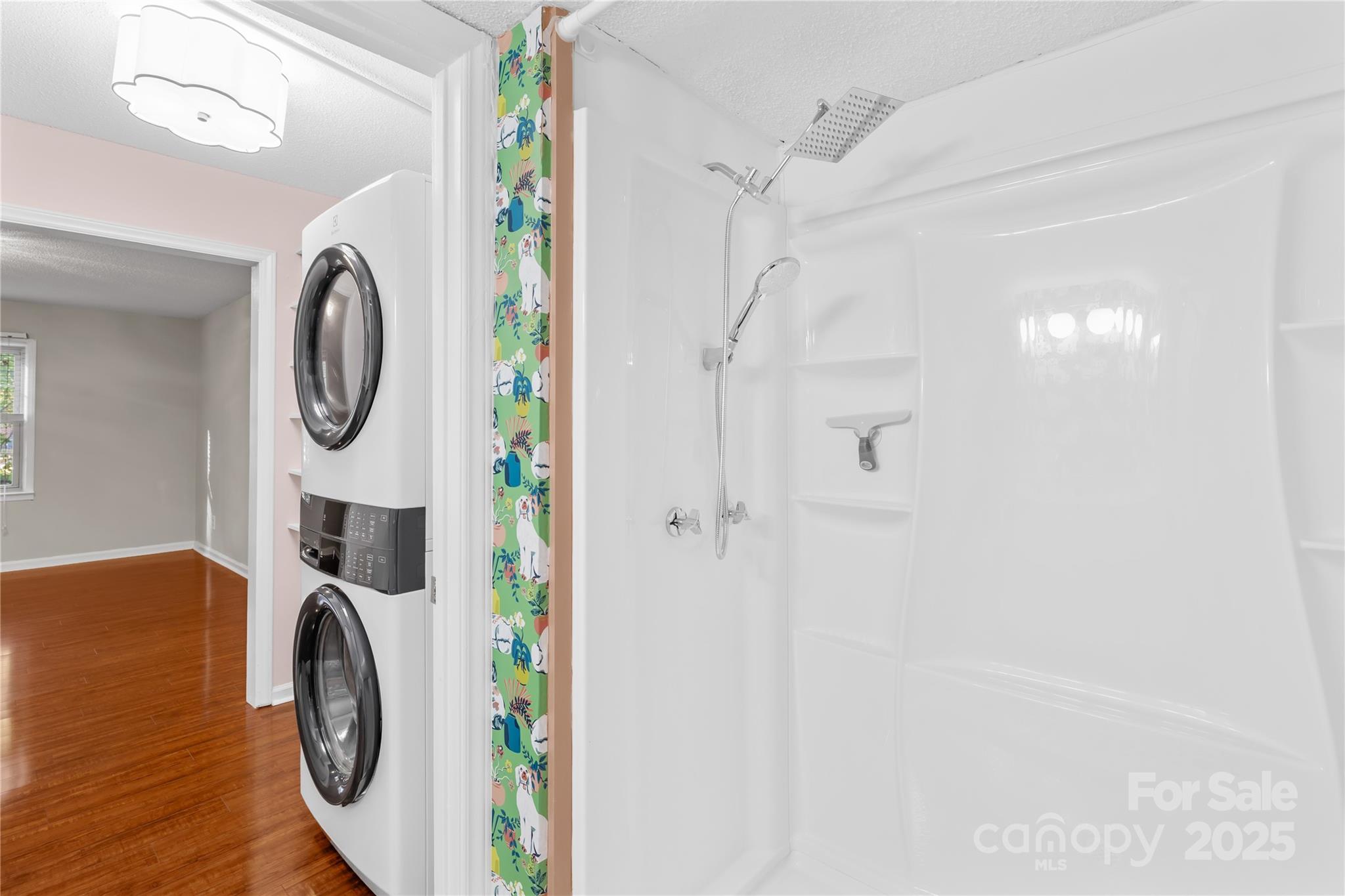 4754 Hedgemore Drive, Unit P Charlotte, NC 28209 - Photo 10 of 19 a utility room with dryer and washer