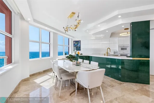 a view of a balcony with lake view and a floor to ceiling window