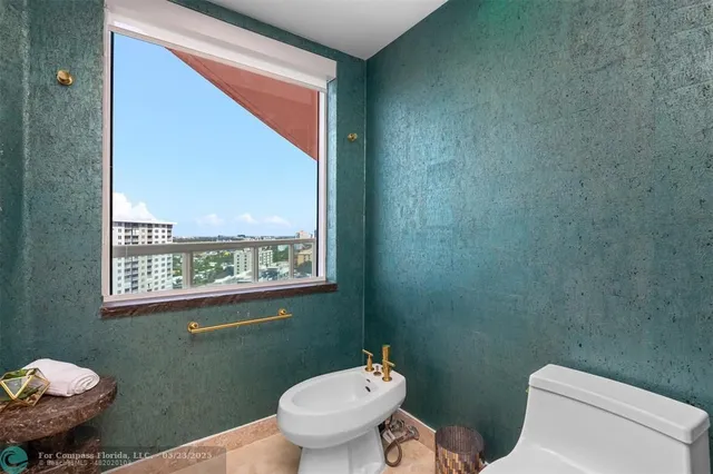 a outdoor living space with furniture and city view