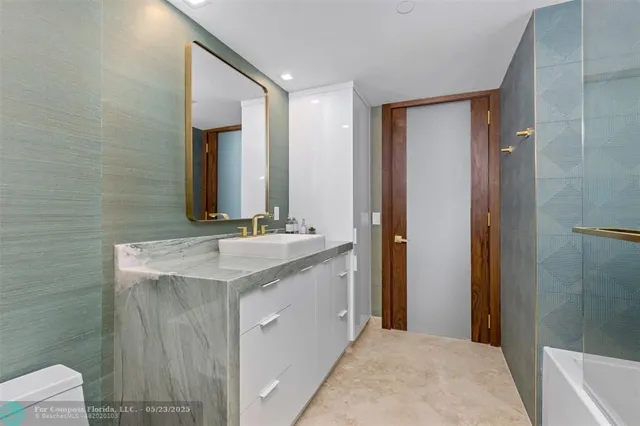 a view of a balcony with wooden stairs