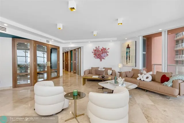 a view of a dining room with furniture and window
