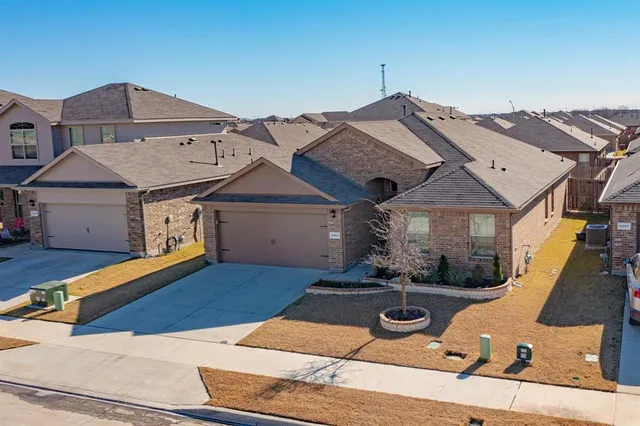 front view of a house with a patio
