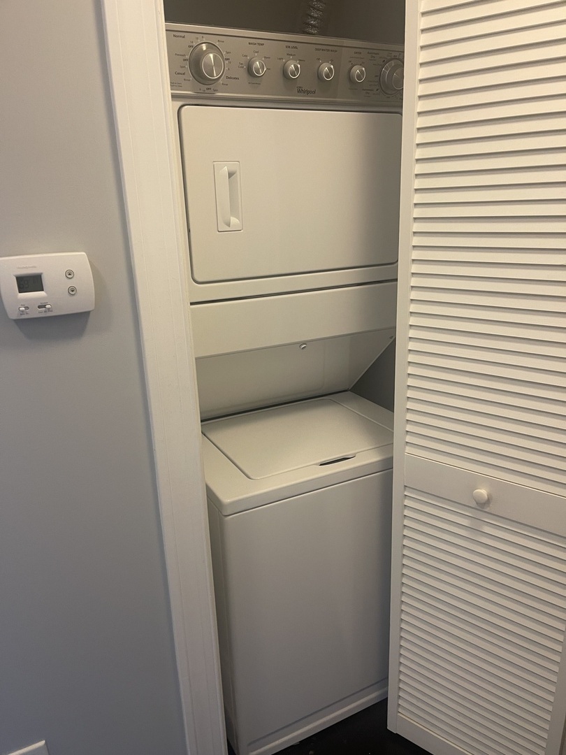 728 North Diamond Lake Road, Unit 211 Mundelein, IL 60060 - Photo 13 of 17 a utility room with dryer and washer