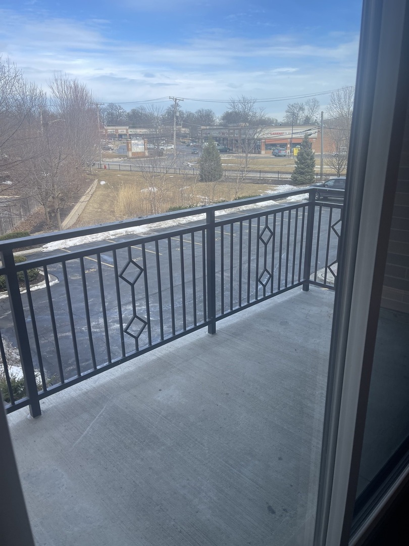 728 North Diamond Lake Road, Unit 211 Mundelein, IL 60060 - Photo 17 of 17 a view of balcony with ocean view