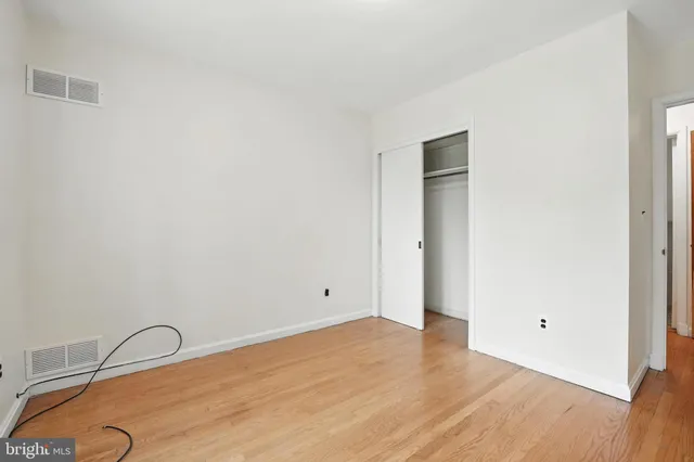 a bathroom with a sink toilet and mirror